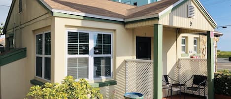 Front view of cottage with private deck area for your morning coffee.  