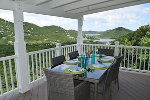 Dine alfresco with a view of Coral Bay and Hurricane Hole! 