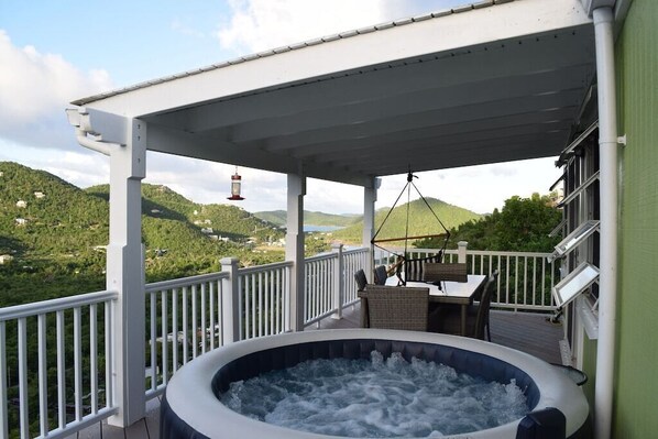 Relax in the hot tub and enjoy the sunset, water view, valley view, and stars!