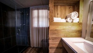 Check out the big shower stall and vanity in the master bath! All bath and bed linens for your stay are provided, too.