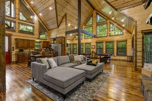 Cathedral ceilings and picturesque windows throughout the cabin.