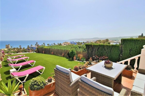 Stunning sea views from the terrace and gardens of this property