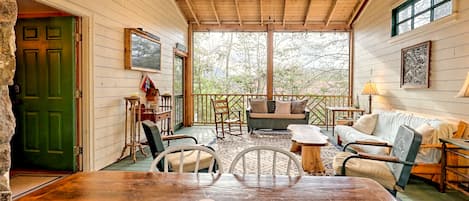 Spacious screened-in patio, plenty of seating.