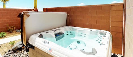 Enjoy relaxing in private hot tub in unbeatable location