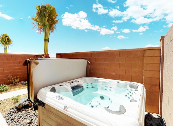 Enjoy relaxing in private hot tub in unbeatable location