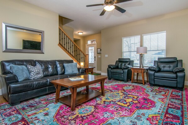 Comfortable family room with leather sofa and chairs