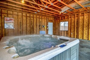 Private hot tub in garage out of the elements