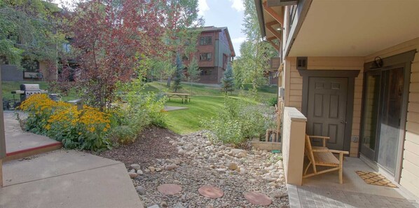Patio with direct access to BBQ & picnic area, pool, hot tubs, sauna, clubhouse