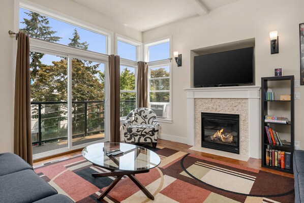 This home has tons of space for a group to gather to watch movies, enjoy meals, or play games (which we provide!) (Note: photos are of a nearly identical home we manage next door as we await a pro photo shoot)