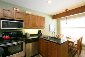 The well-equipped kitchen provides all the comforts of cooking in your own home