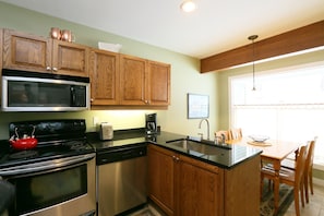 The well-equipped kitchen provides all the comforts of cooking in your own home