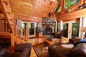 Living Room with Wood Burning Fireplace and a Sleeper Sofa