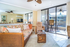 Roomy living area with great open floor plan flow bringing the outside in.