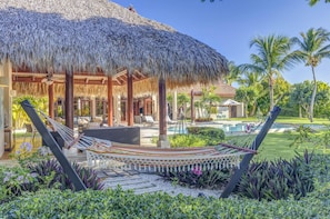 Villa Caballet – A Tropical Oasis with Golf Course Views (5601)