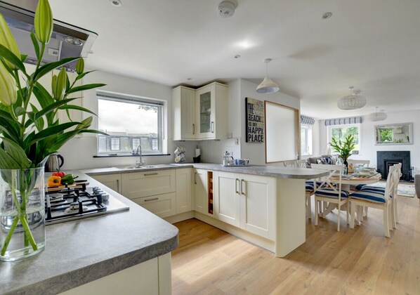 Modern contemporary style kitchen and dining area, a great social space