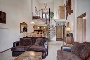 Living room seating up into loft