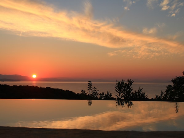 beautiful sunrise over pool