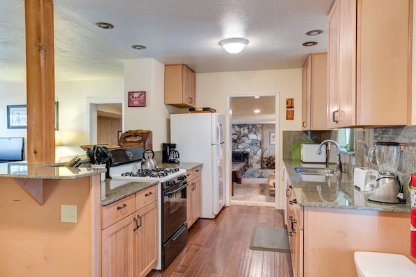 Newly remodeled kitchen with granite counter tops