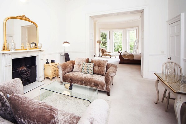 Lounge leading to bedroom via original wedding doors
