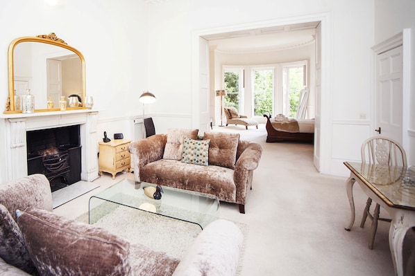 Lounge leading to bedroom via original wedding doors