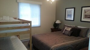 Queen Bedroom with single bunks