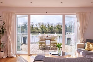 Ground floor: The open plan living area flows out onto the private deck
