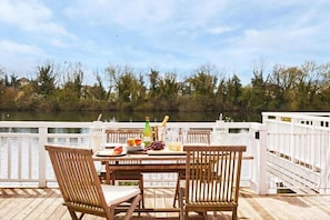 The private deck is a perfect spot for alfresco dining or simply to relax