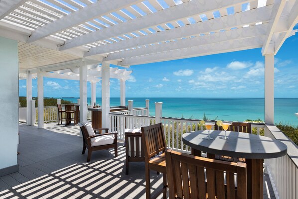 Main Lodge veranda with 50 mile ocean and sunset view.