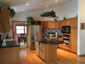 Kitchen with dining room beyond.