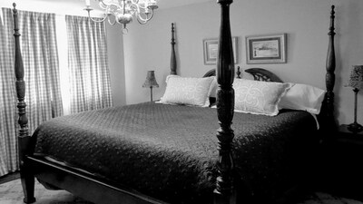 Bedroom with a King Bed in the Guest House - Lancaster, KY 