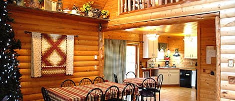 Dining area -loft over looking (12 chairs)  Picnic tables on deck