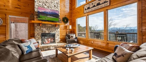 Wall of windows & a 27' tall fireplace-relax w/a beautiful mountain view!