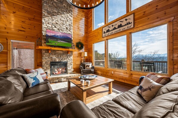 Wall of windows & a 27' tall fireplace-relax w/a beautiful mountain view!