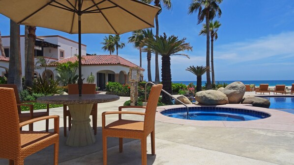 Enjoy a poolside drink and take in the stunning ocean vistas