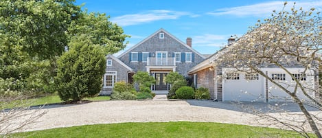 Front of house with circular driveway