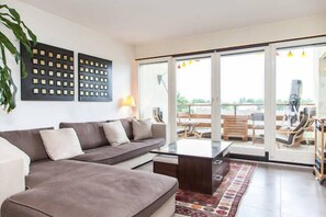 Living room opening on the balcony