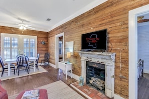 Stay cozy by the fireplace with family