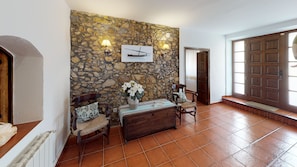 Hall with stone wall