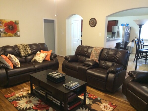 All reclining sofas/chairs in living room