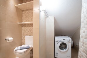 A private washing machine is provided in your room.