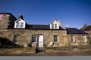 South facing traditional sandstone cottage in the picturesque small town of Dollar