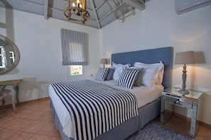 The large modern and airy bedroom , super king bed , air conditioning