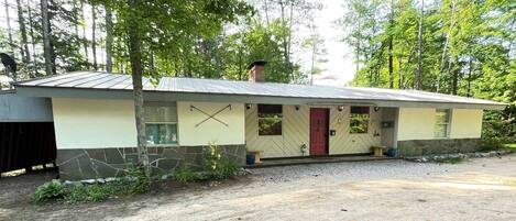 Single level with carport for keeping your toys undercover