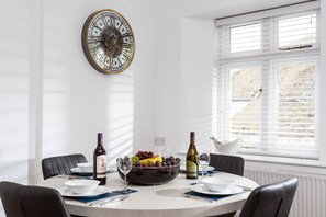 Dining table seating four guests