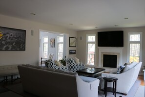 Family Room opens up to Den