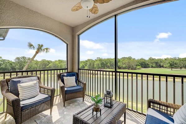 Enjoy a morning coffee on the screened patio with water/golf course view
