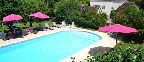 Relax in the superb large heated pool