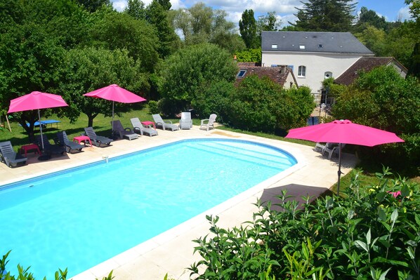 Relax in the superb large heated pool