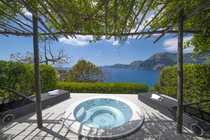 Villa's private jacuzzi with sea views