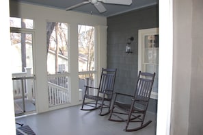 Front screened porch with ceiling fan - perfect for cocktails or iced tea!